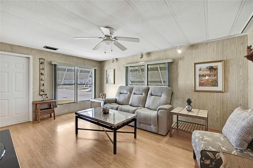 3141 Nantucket Drive Holiday, FL 34690 - Photo 5 of 34 a living room with furniture and a window