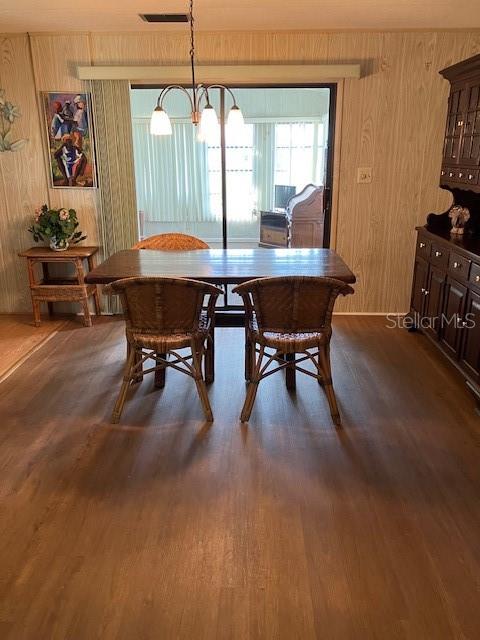 3141 Nantucket Drive Holiday, FL 34690 - Photo 7 of 29 a dining room with furniture and window