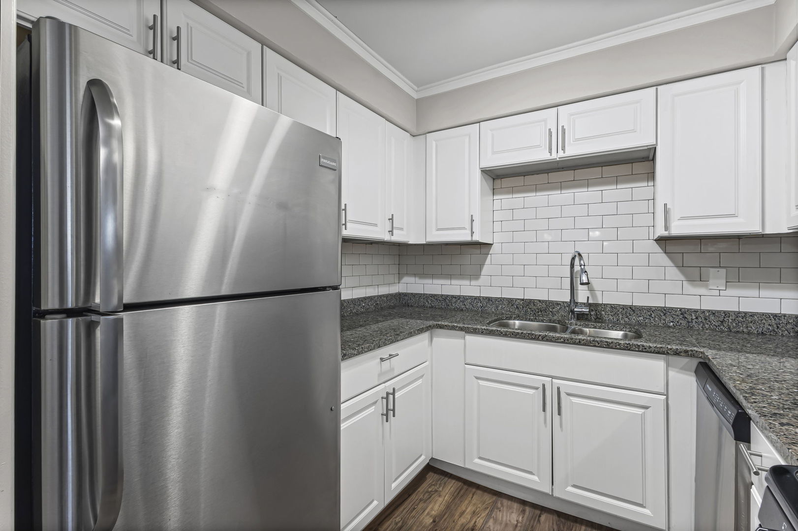 14457 Lamon Avenue, Unit 3N Midlothian, IL 60445 - Photo 13 of 21 a white refrigerator freezer sitting inside of a kitchen