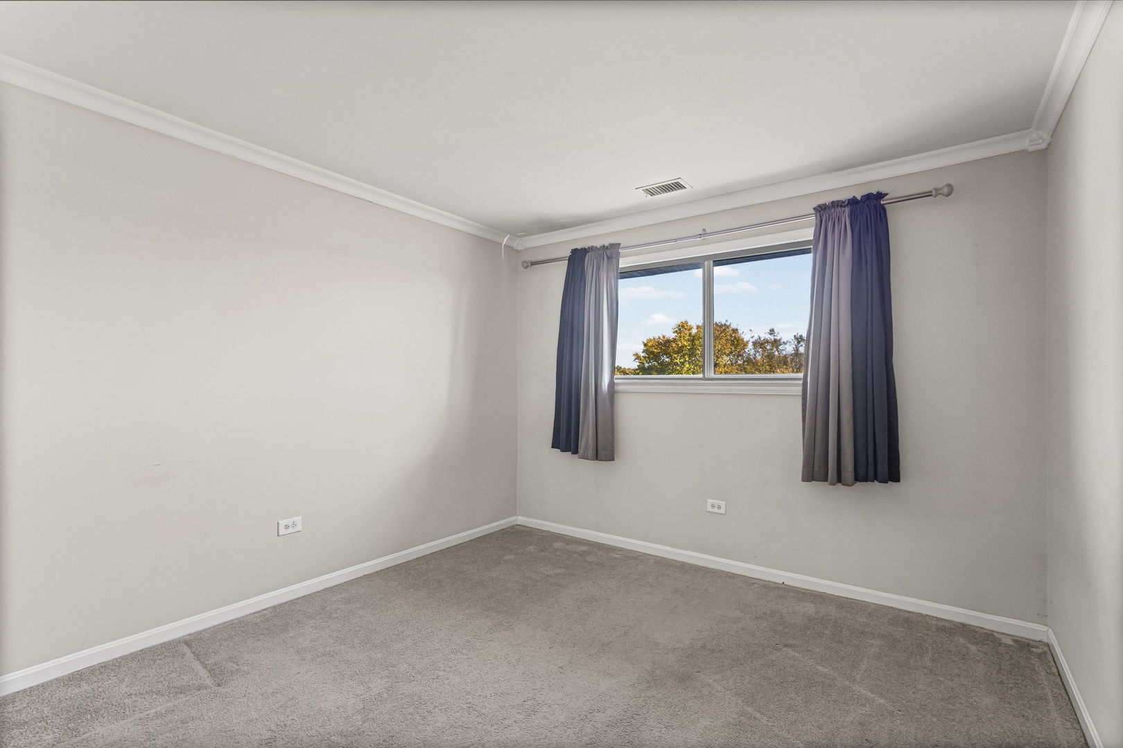14457 Lamon Avenue, Unit 3N Midlothian, IL 60445 - Photo 18 of 21 an empty room with window