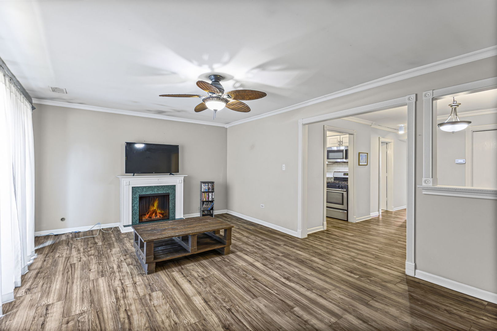 14457 Lamon Avenue, Unit 3N Midlothian, IL 60445 - Photo 4 of 21 a living room with furniture and a fireplace
