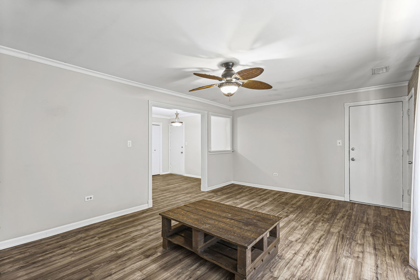 14457 Lamon Avenue, Unit 3N Midlothian, IL 60445 - Photo 6 of 21 a bedroom with a bed and a chandelier