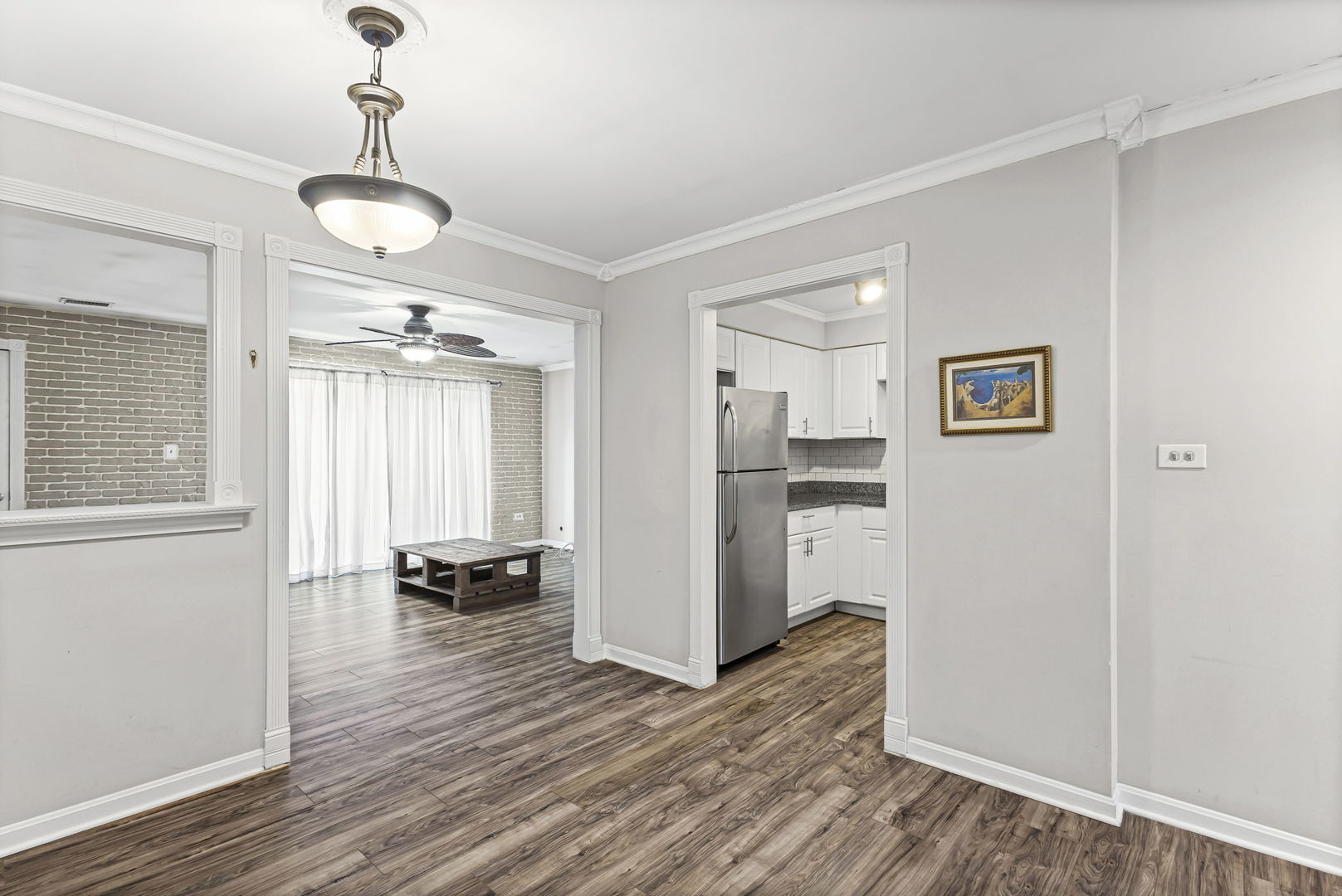 14457 Lamon Avenue, Unit 3N Midlothian, IL 60445 - Photo 9 of 21 a view of a kitchen from the hallway