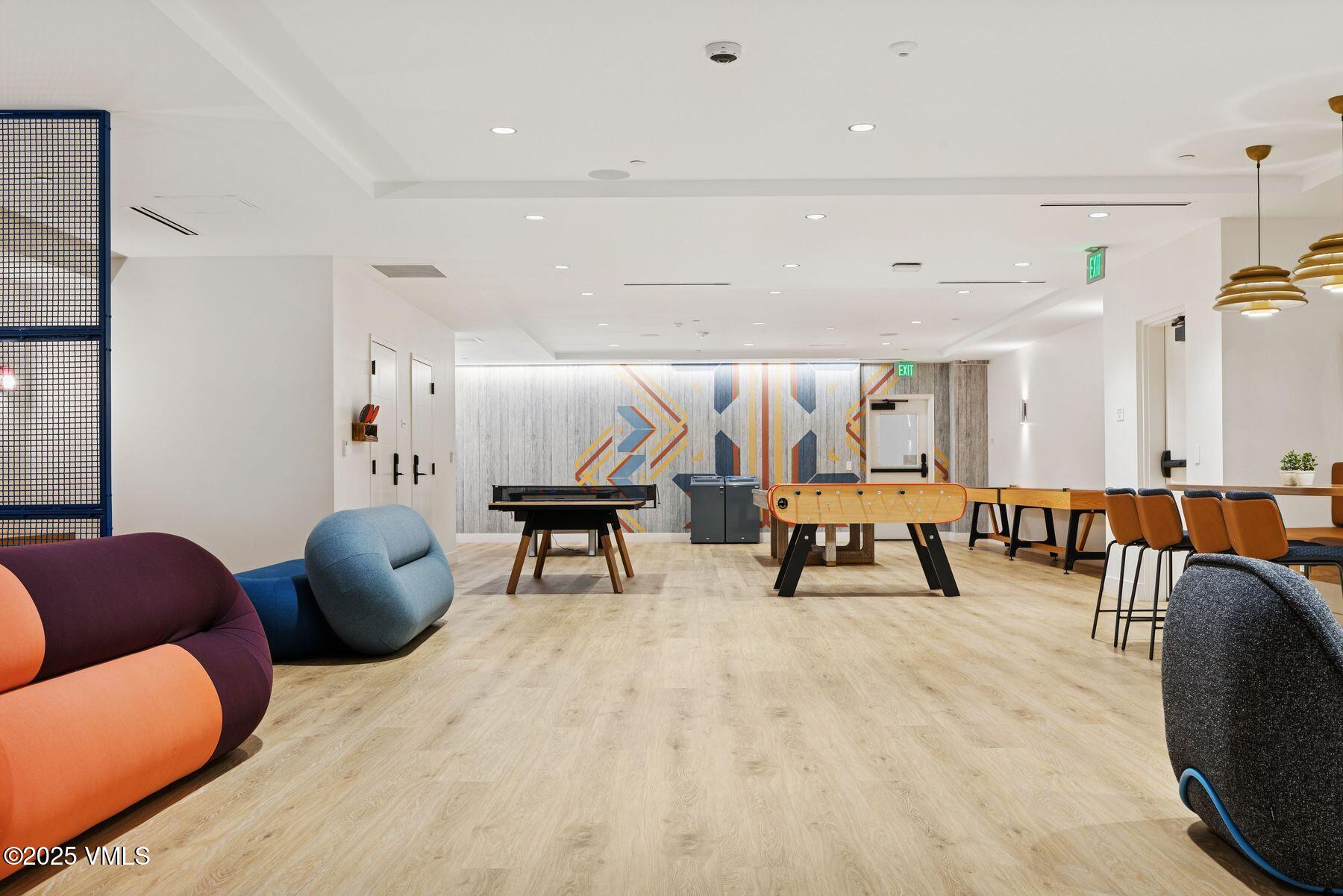 38460 Hwy 6 Avon Co 81620, Unit 205 Avon, CO 81620 - Photo 34 of 47 a living room with furniture and a table