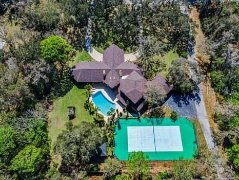 an aerial view of a house with a garden