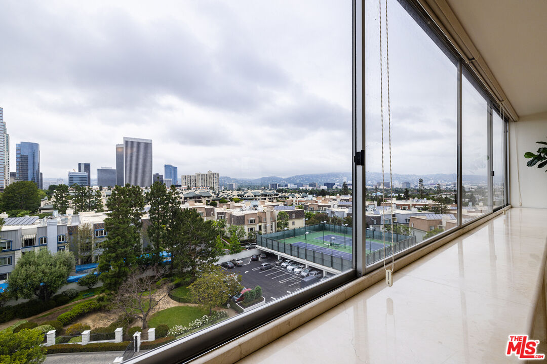 2220 Avenue Of The Stars, Unit 803 Los Angeles, CA 90067 - Photo 6 of 25 a view of a city from a balcony