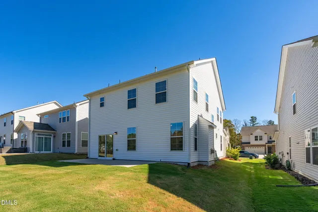 a view of a house with a big yard