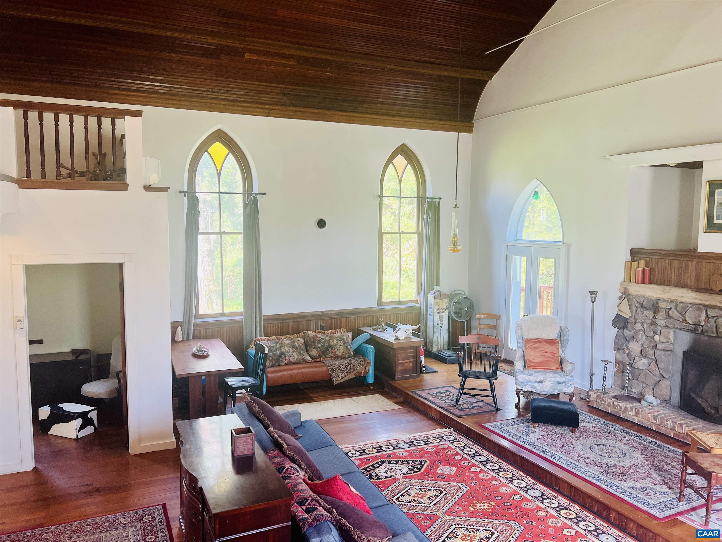 1105 Summerdean Road Middlebrook, VA 24459 - Photo 13 of 75 a view of a livingroom with furniture and a fireplace
