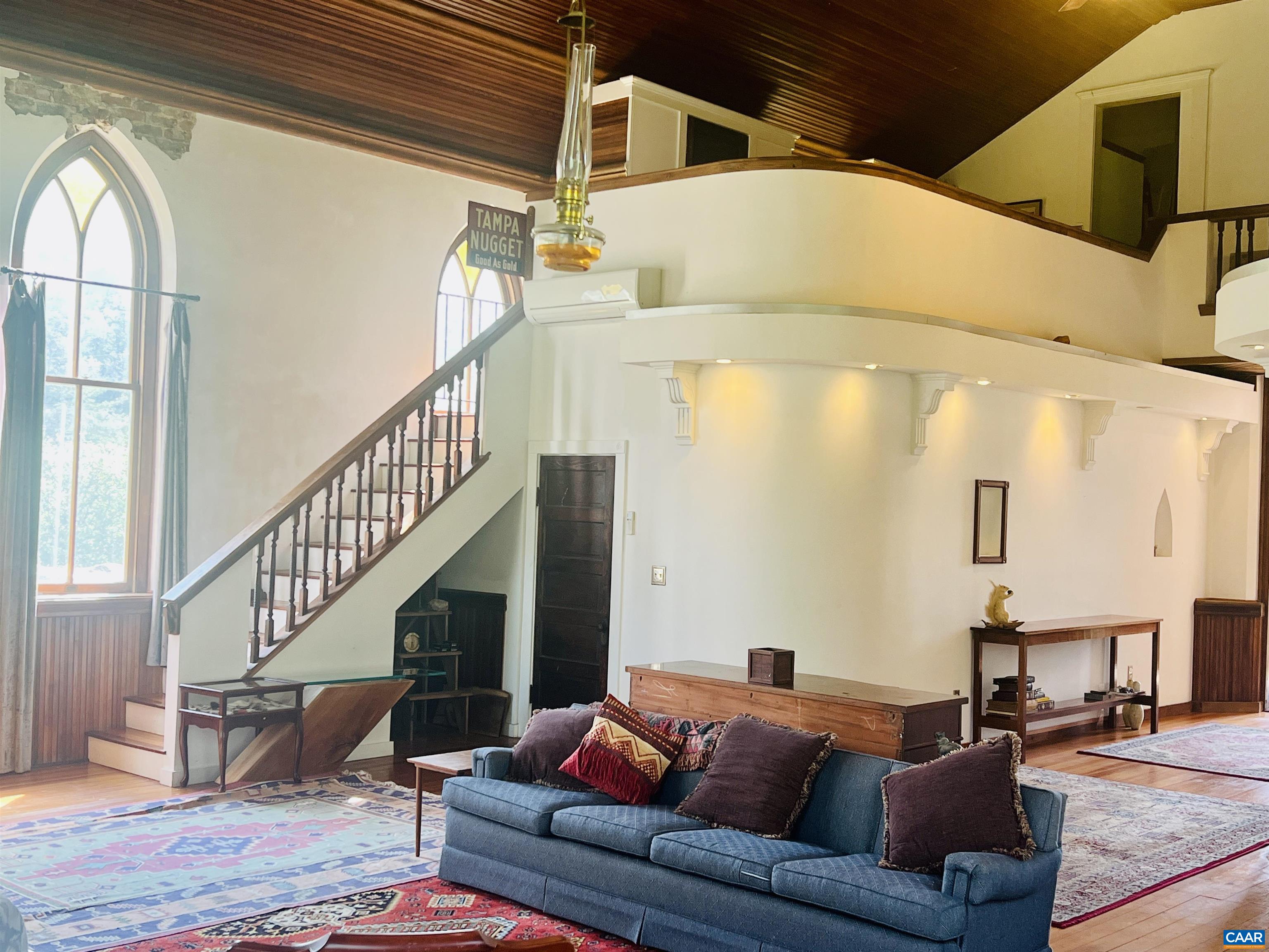 1105 Summerdean Road Middlebrook, VA 24459 - Photo 14 of 75 a living room with furniture and a dining table with wooden floor