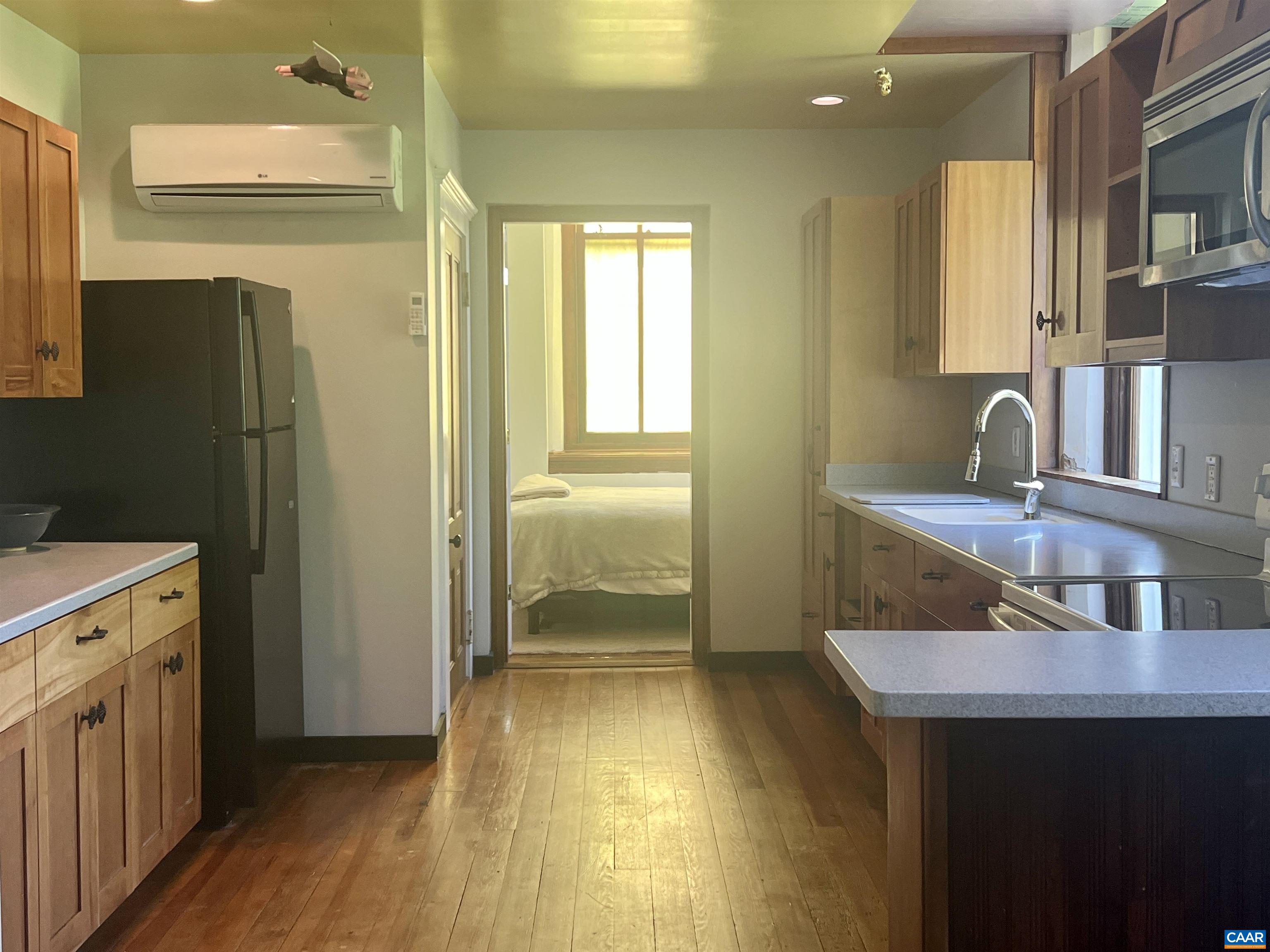 1105 Summerdean Road Middlebrook, VA 24459 - Photo 19 of 75 a bathroom with a sink a mirror and a shower