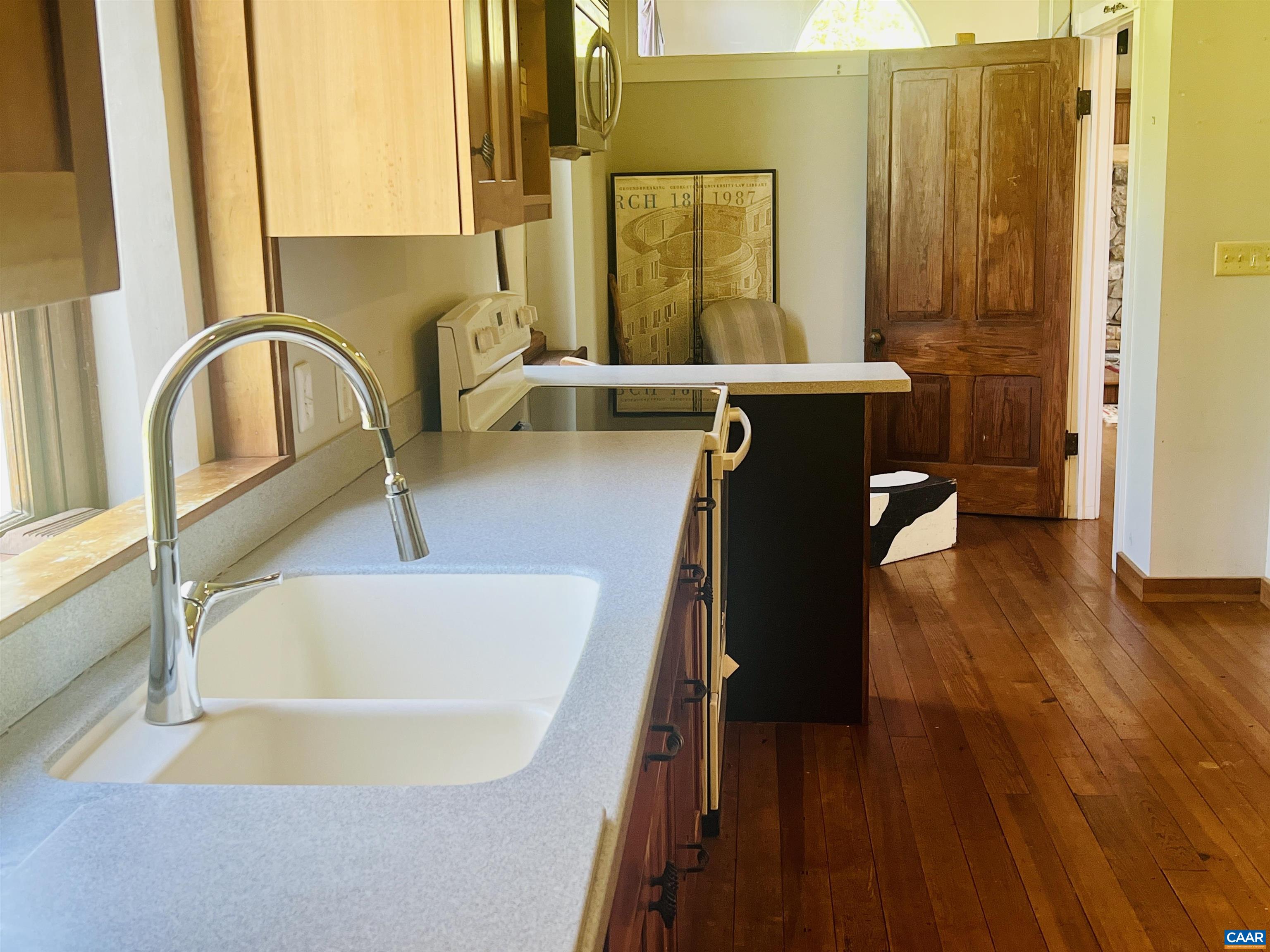 1105 Summerdean Road Middlebrook, VA 24459 - Photo 21 of 75 a bathroom with a sink and a large mirror