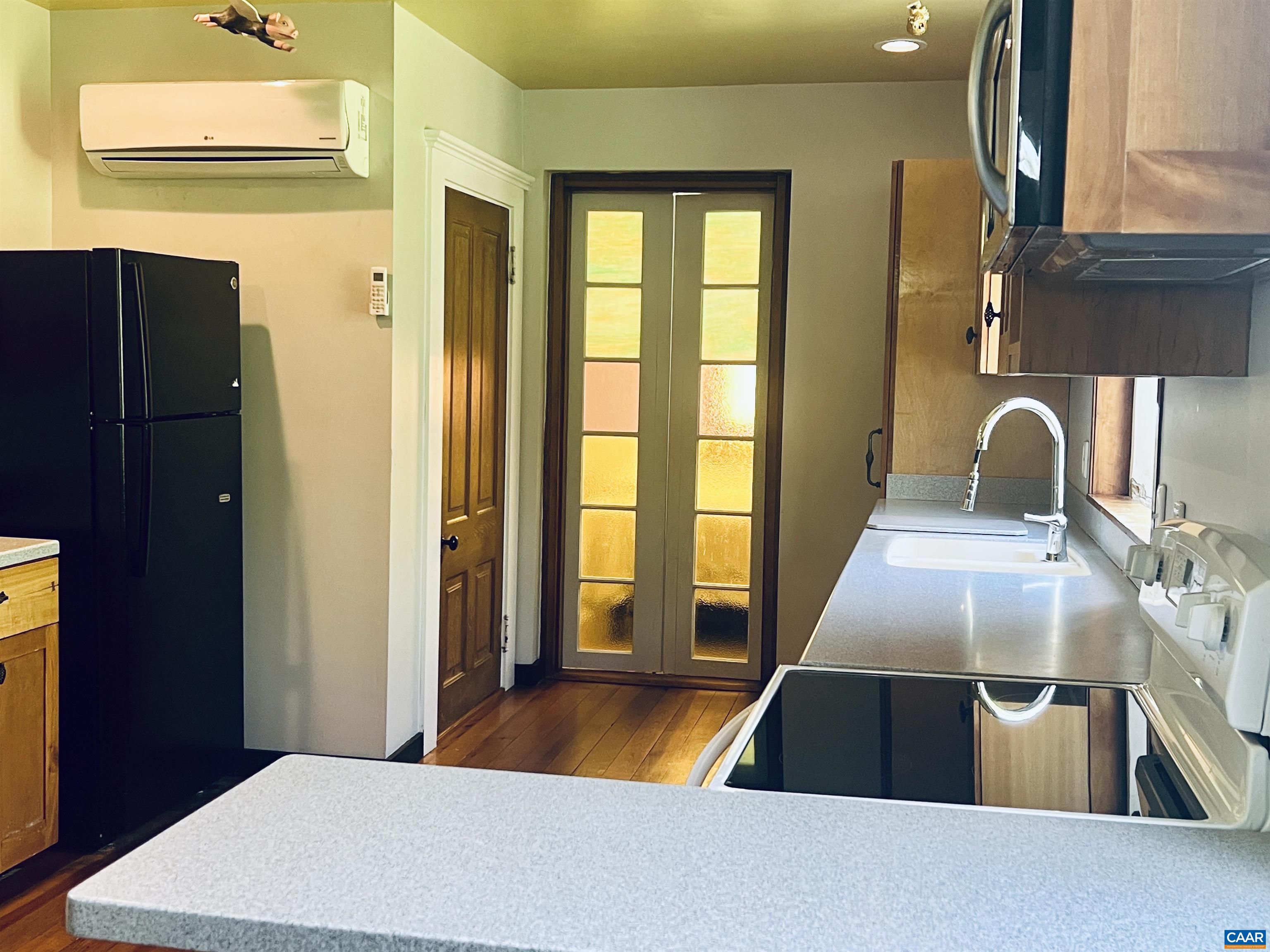 1105 Summerdean Road Middlebrook, VA 24459 - Photo 22 of 75 a kitchen with a refrigerator and a window