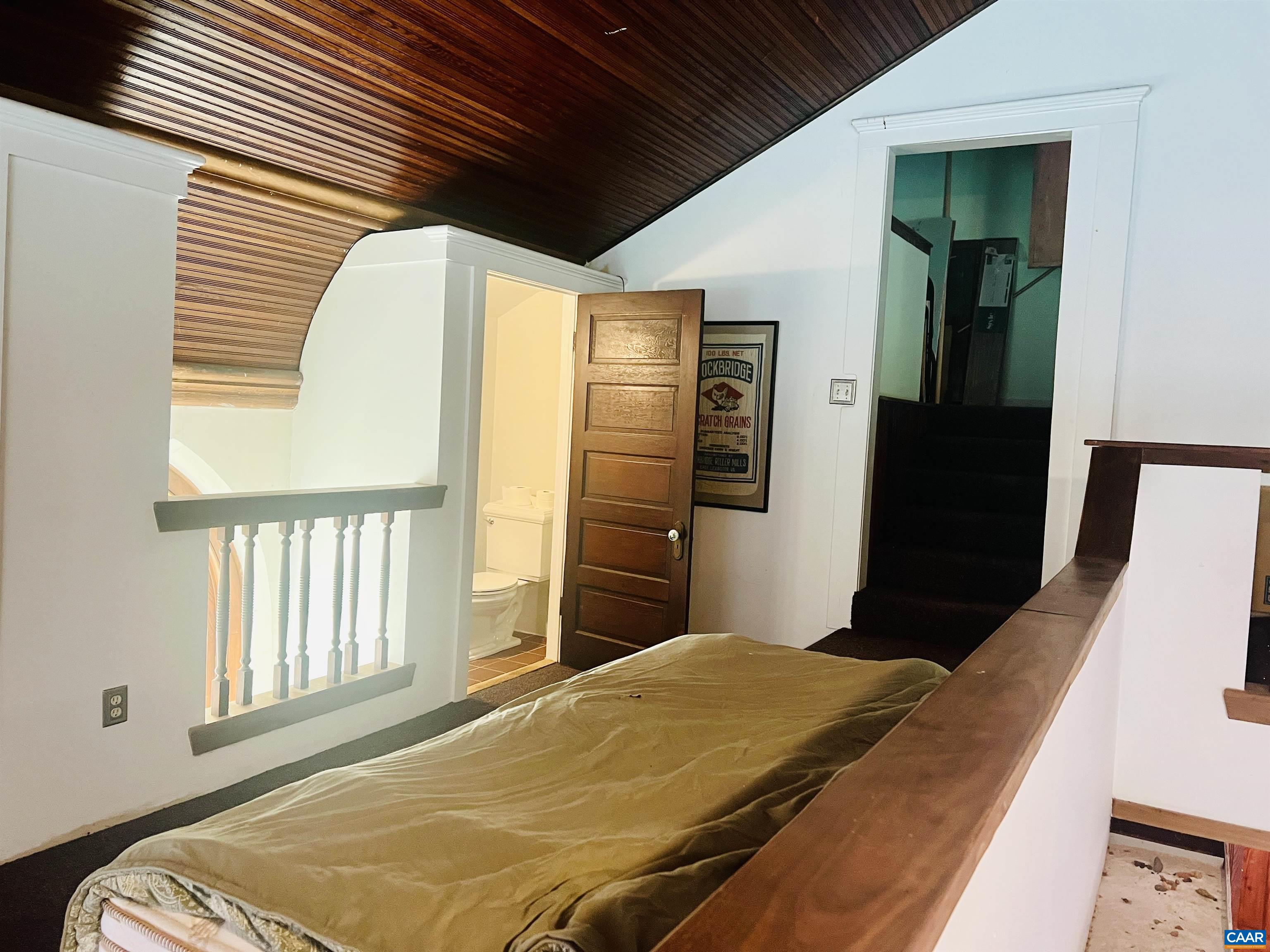 1105 Summerdean Road Middlebrook, VA 24459 - Photo 40 of 75 a bedroom with bed and wooden floor