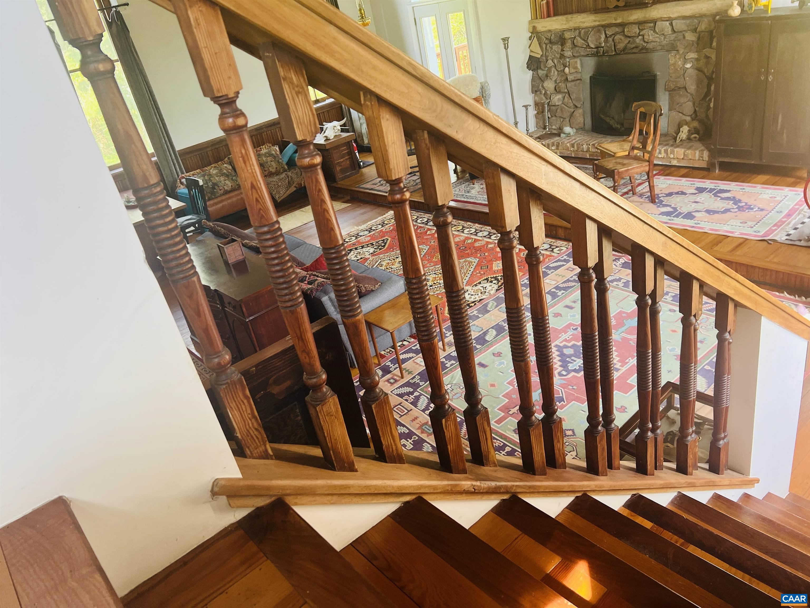 1105 Summerdean Road Middlebrook, VA 24459 - Photo 58 of 75 a view of staircase with wooden floor and chair