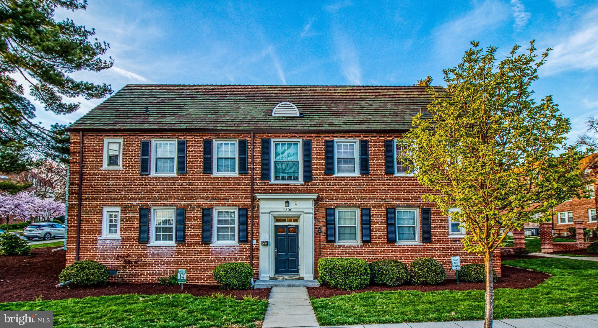 3800 V Street Southeast, Unit 101 Washington, DC 20020 - Photo 1 of 28 front view of a house with a yard