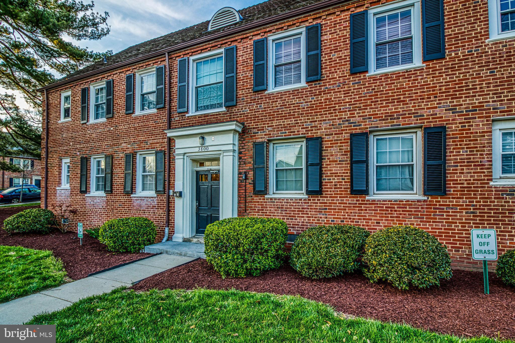 3800 V Street Southeast, Unit 101 Washington, DC 20020 - Photo 2 of 28 a view of a brick house with a yard and plants