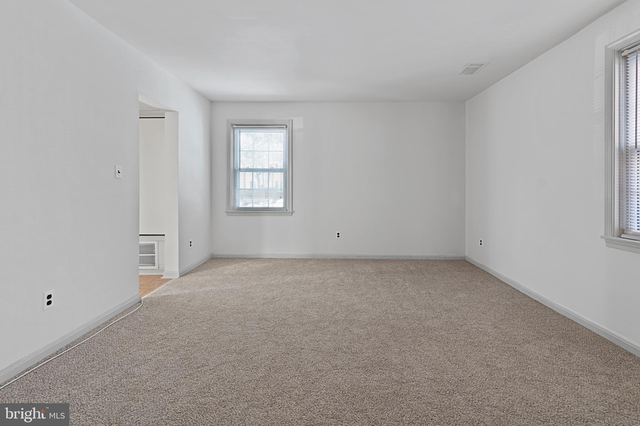 3800 V Street Southeast, Unit 101 Washington, DC 20020 - Photo 11 of 28 a view of an empty room with a window