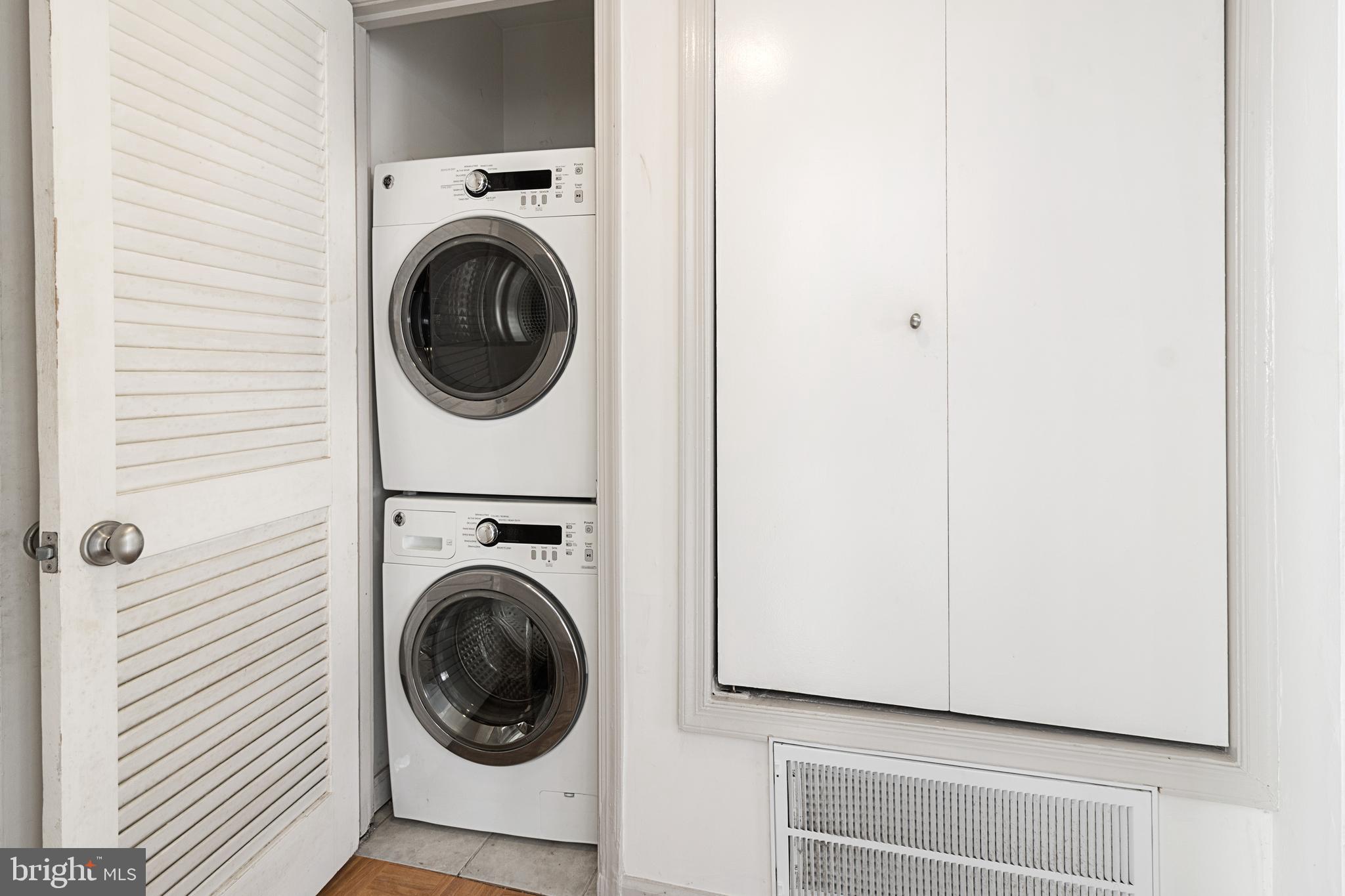 3800 V Street Southeast, Unit 101 Washington, DC 20020 - Photo 17 of 28 a utility room with dryer and washer