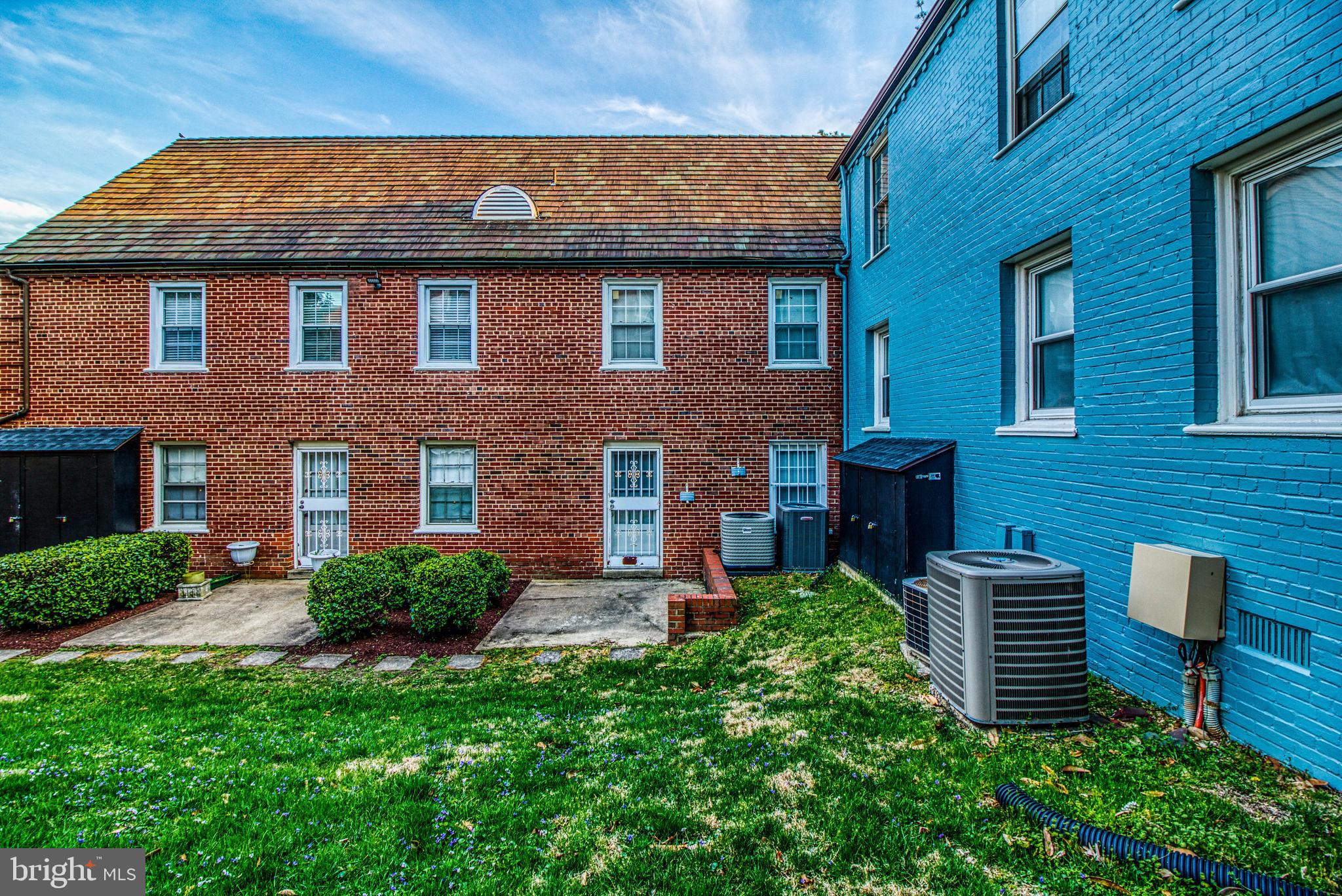 3800 V Street Southeast, Unit 101 Washington, DC 20020 - Photo 25 of 28 a front view of a house with garden