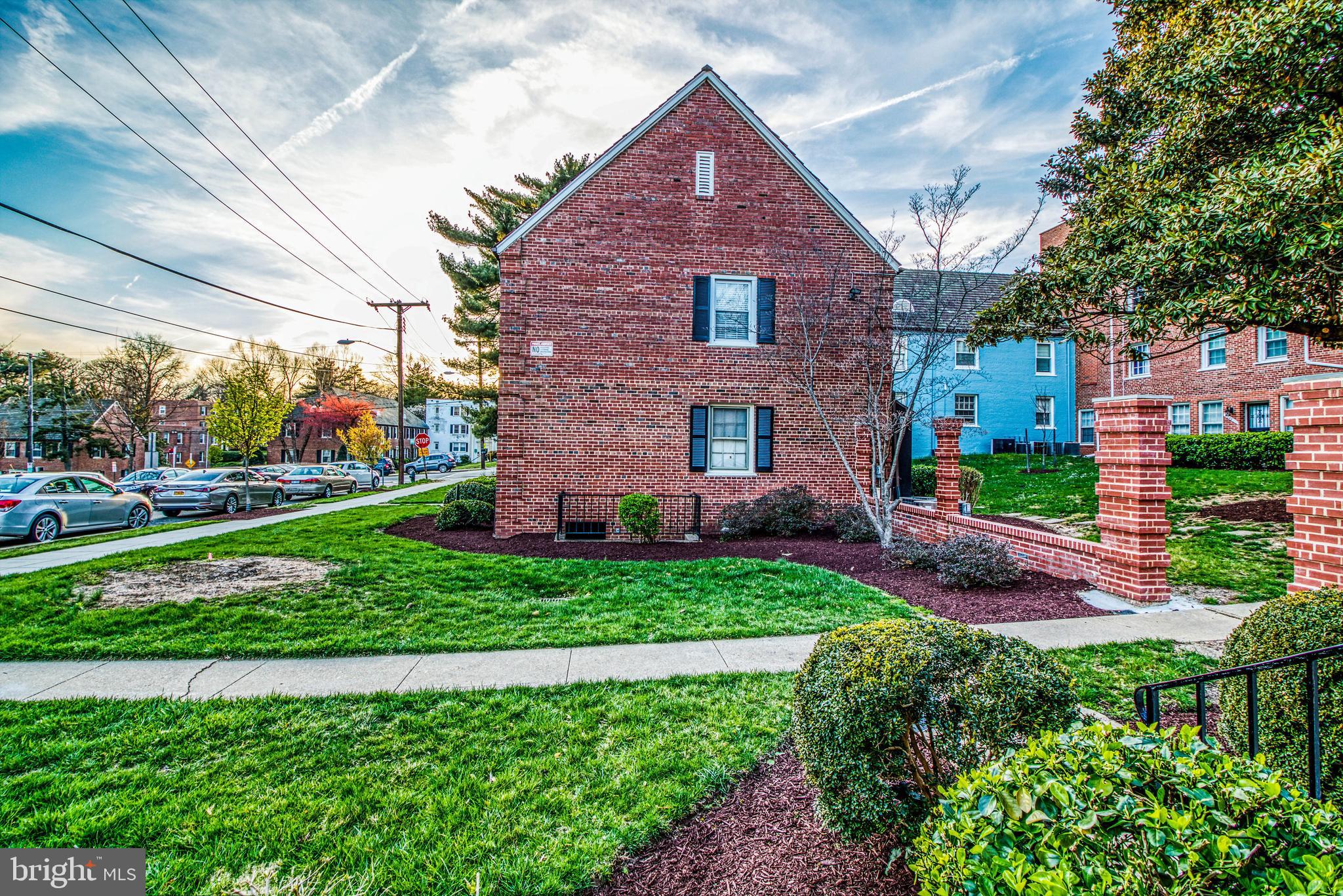 3800 V Street Southeast, Unit 101 Washington, DC 20020 - Photo 26 of 28 a front view of a house with a yard