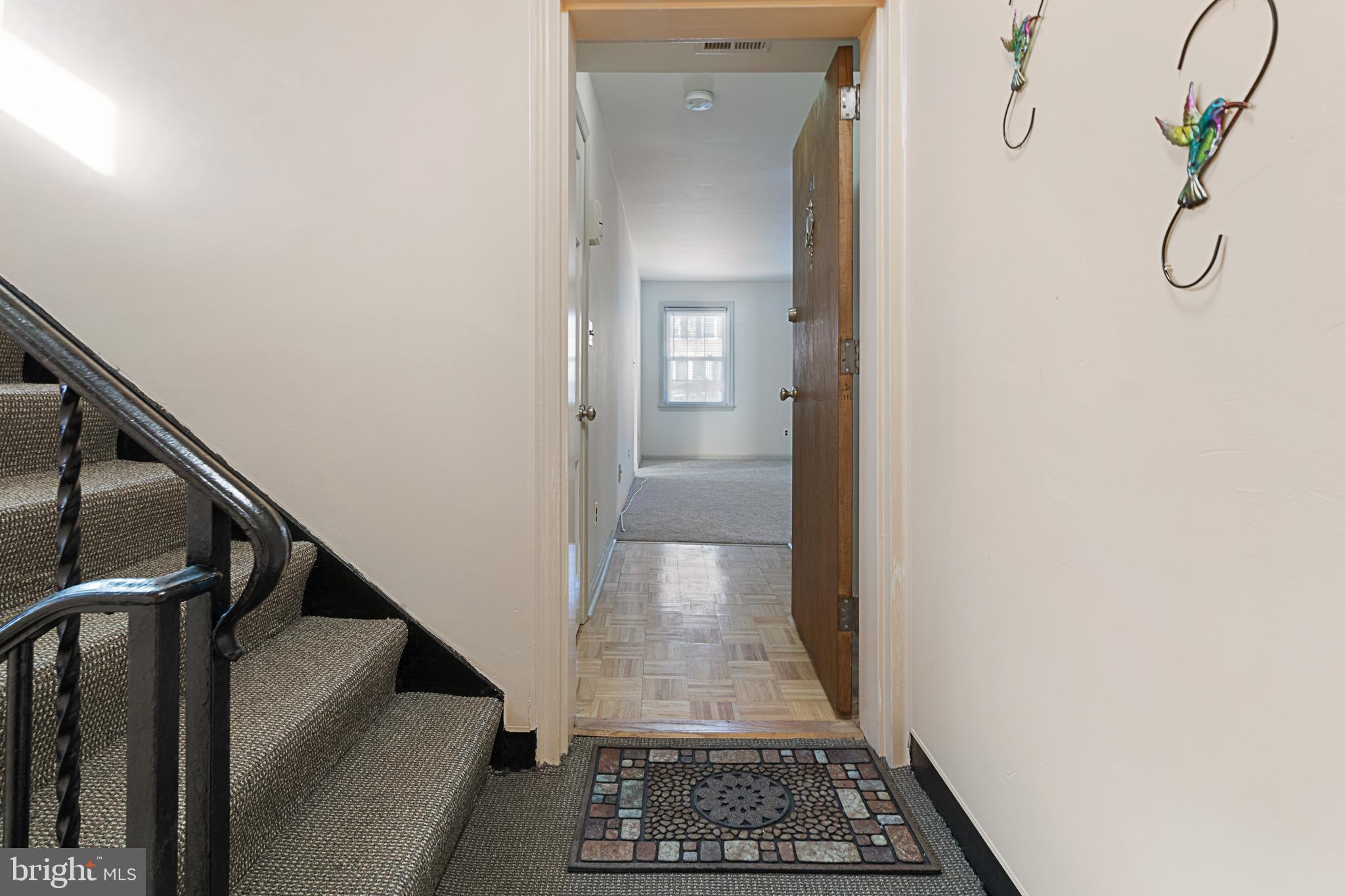 3800 V Street Southeast, Unit 101 Washington, DC 20020 - Photo 4 of 28 a view of hallway with stairs