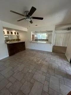 14721 East Tulare Avenue Sanger, CA 93657 - Photo 18 of 21 a large kitchen with cabinets and a stove