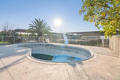 14721 East Tulare Avenue Sanger, CA 93657 - Photo 20 of 21 a view of outdoor space yard and swimming pool
