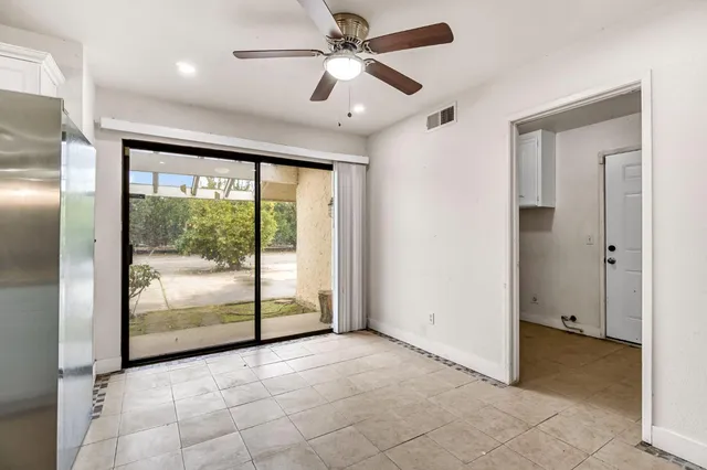 a view of room with walk in closet and bedroom
