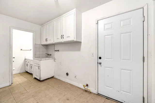a bathroom with a tub and shower