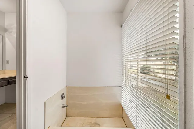 a view of a backyard of a house with a backyard of area and garden