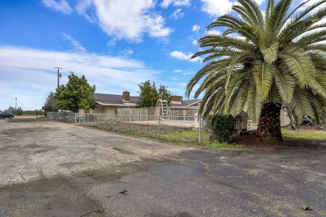a view of a lake with a building in background