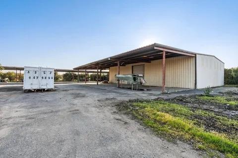 14721 East Tulare Avenue Sanger, CA 93657 - Photo 7 of 21 a view of outdoor space with deck and barbeque oven