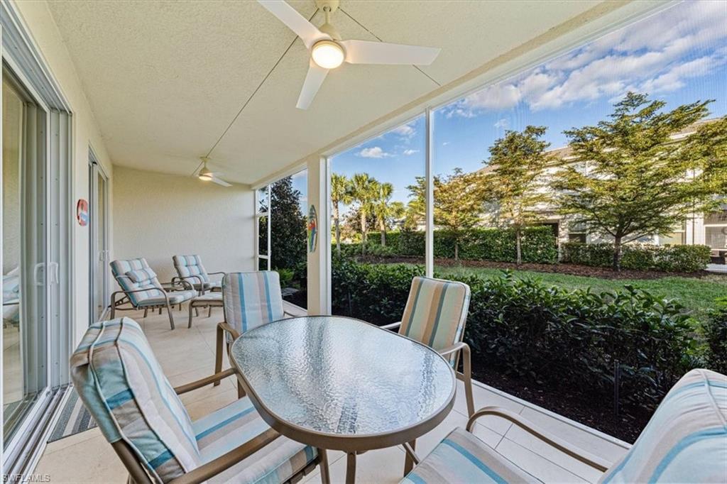 6934 Avalon Circle, Unit 402 Naples, FL 34112 - Photo 15 of 28 a view of a patio in the backyard