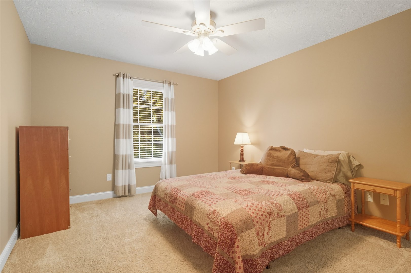 1707 Fraser Drive Normal, IL 61761 - Photo 18 of 33 a bedroom with a bed dresser and a window