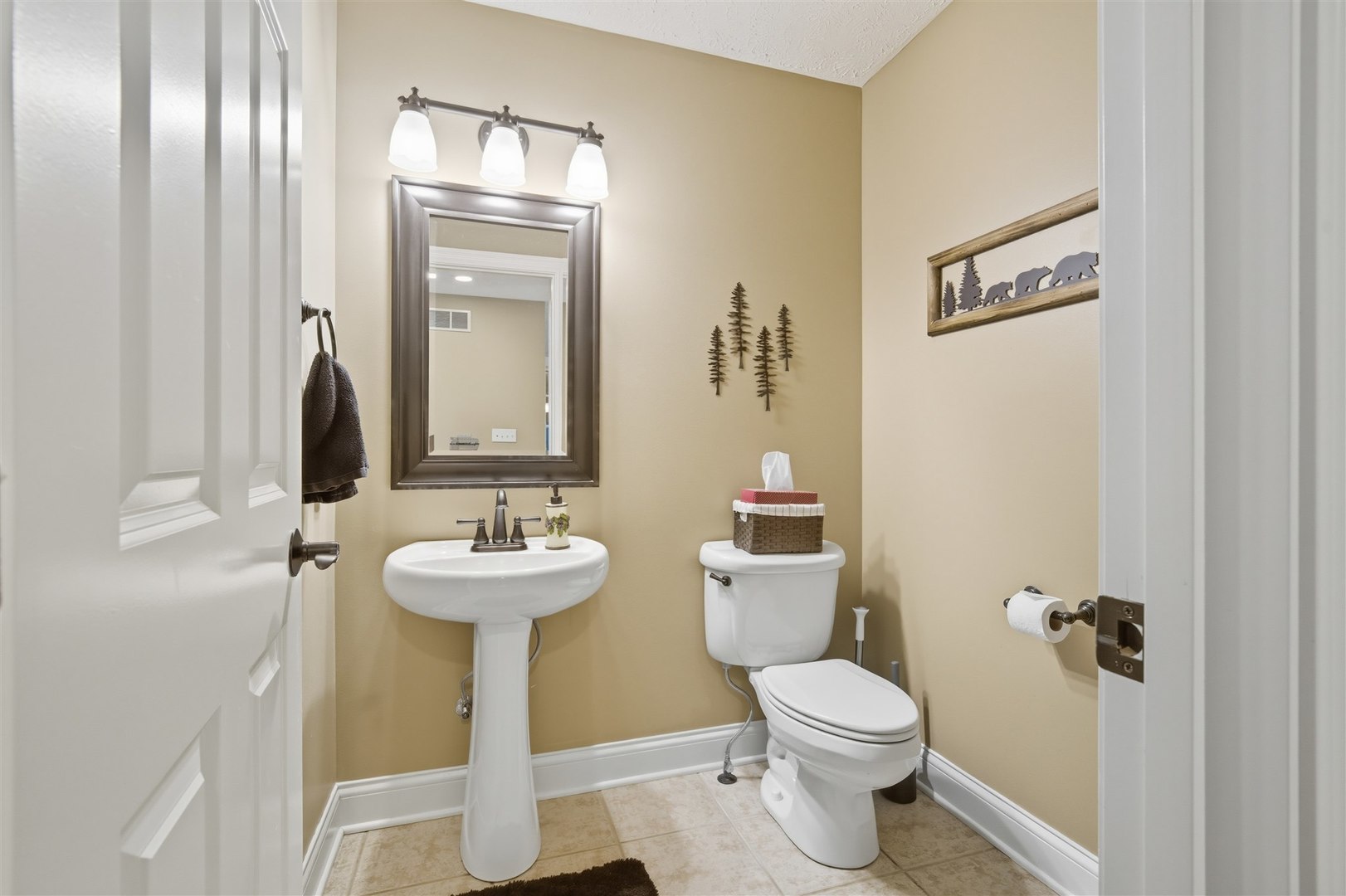 1707 Fraser Drive Normal, IL 61761 - Photo 5 of 33 a bathroom with a sink mirror and toilet