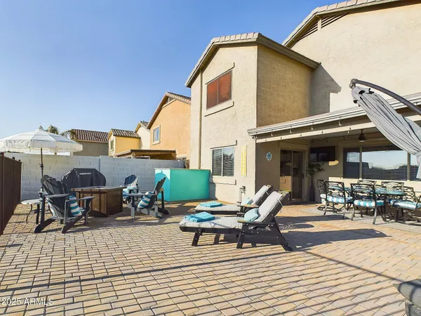 a view of a swimming pool and lounge chair