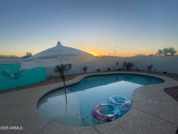 closeup of a sink with wooden floor