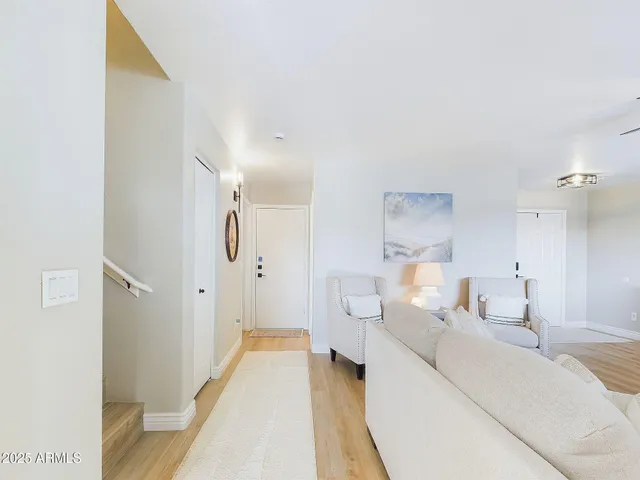 a bathroom with a sink toilet and mirror