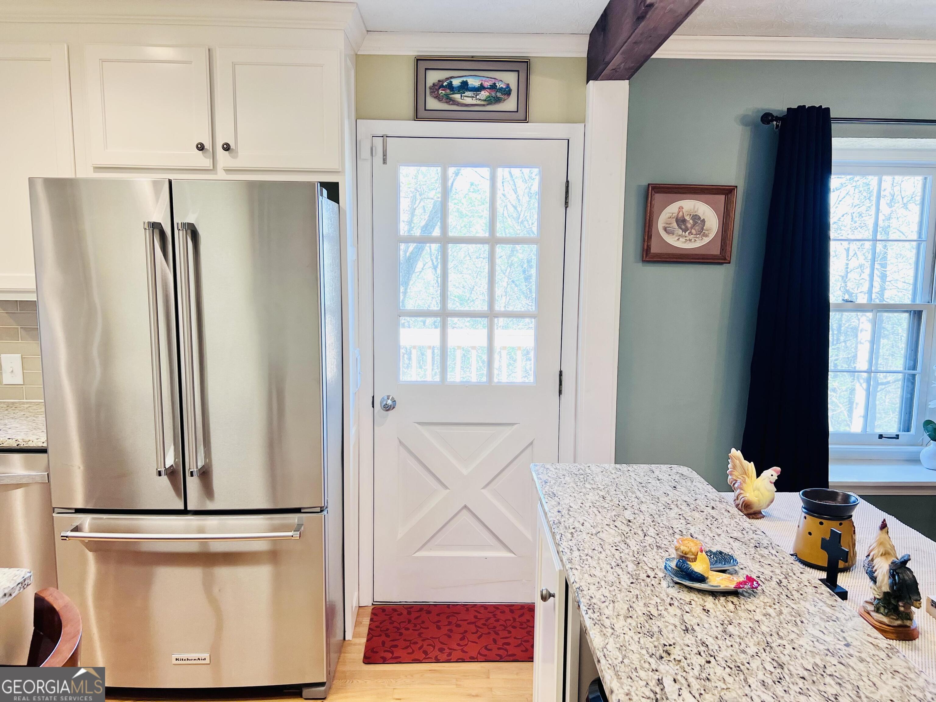 285 Wolf Den Road Royston, GA 30662 - Photo 18 of 61 a kitchen with stainless steel appliances granite countertop a refrigerator and a stove