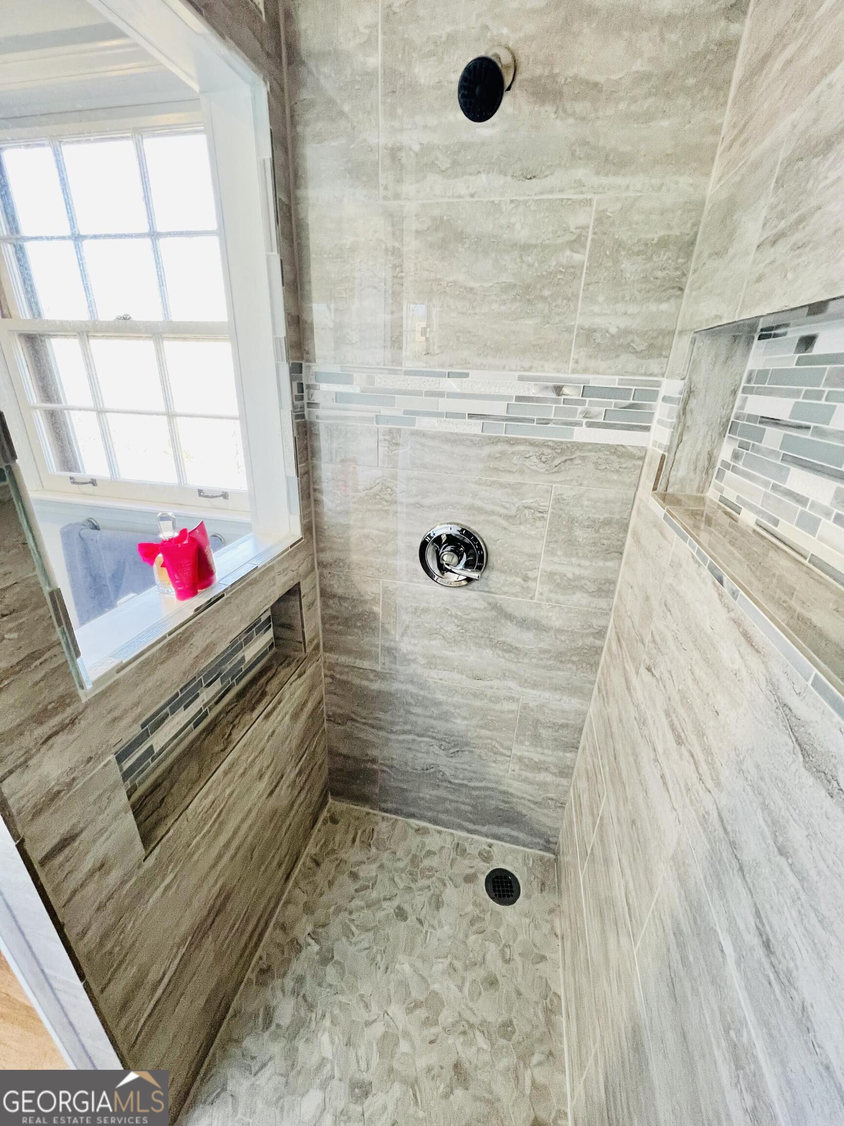 285 Wolf Den Road Royston, GA 30662 - Photo 26 of 61 a bathroom with a shower