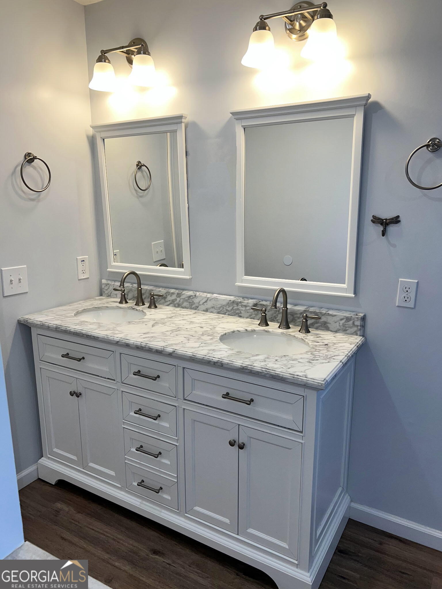 285 Wolf Den Road Royston, GA 30662 - Photo 28 of 61 a bathroom with a granite countertop sink and a mirror