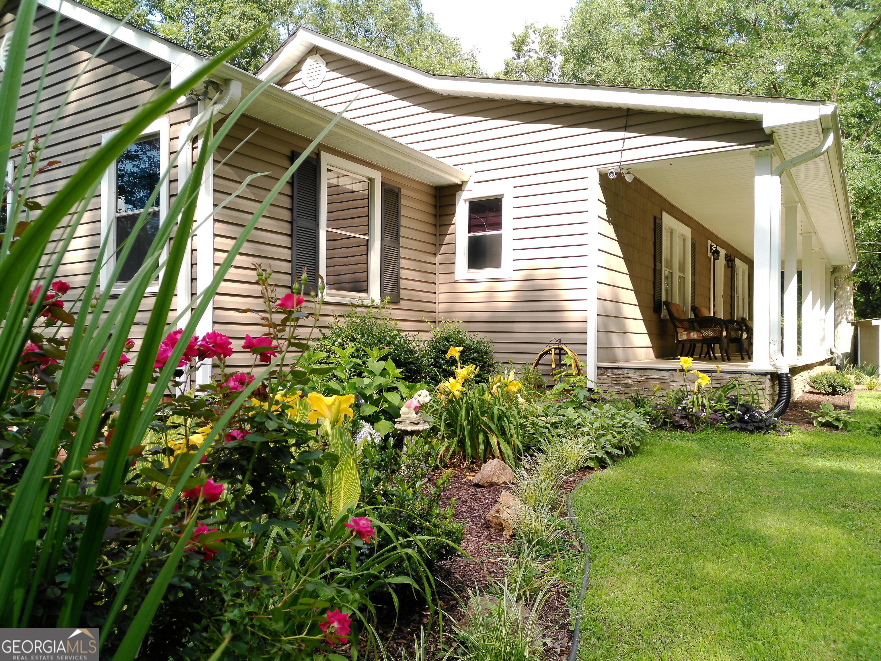 285 Wolf Den Road Royston, GA 30662 - Photo 3 of 61 a view of a house with yard and garden