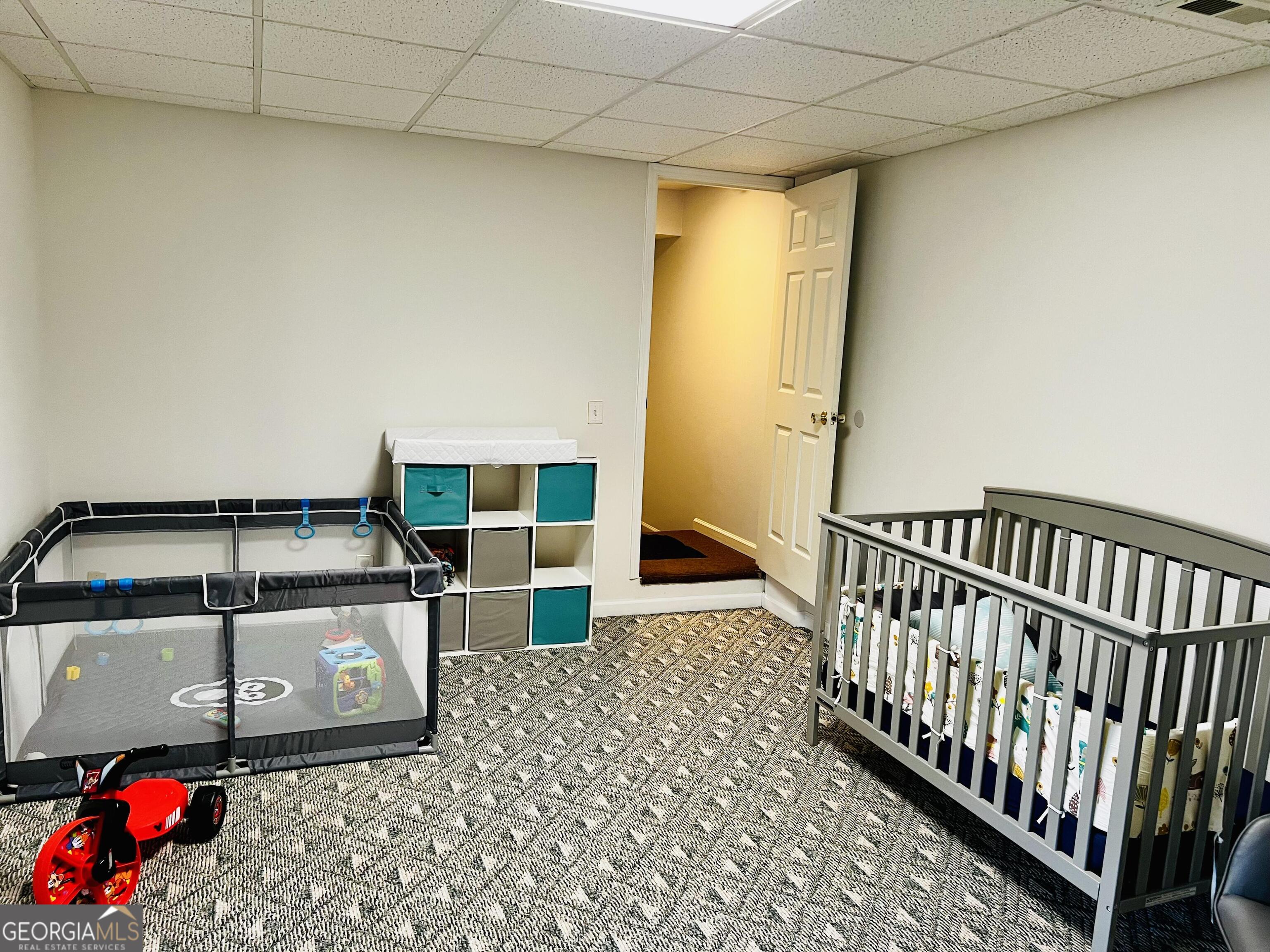 285 Wolf Den Road Royston, GA 30662 - Photo 36 of 61 a bedroom with furniture and rug