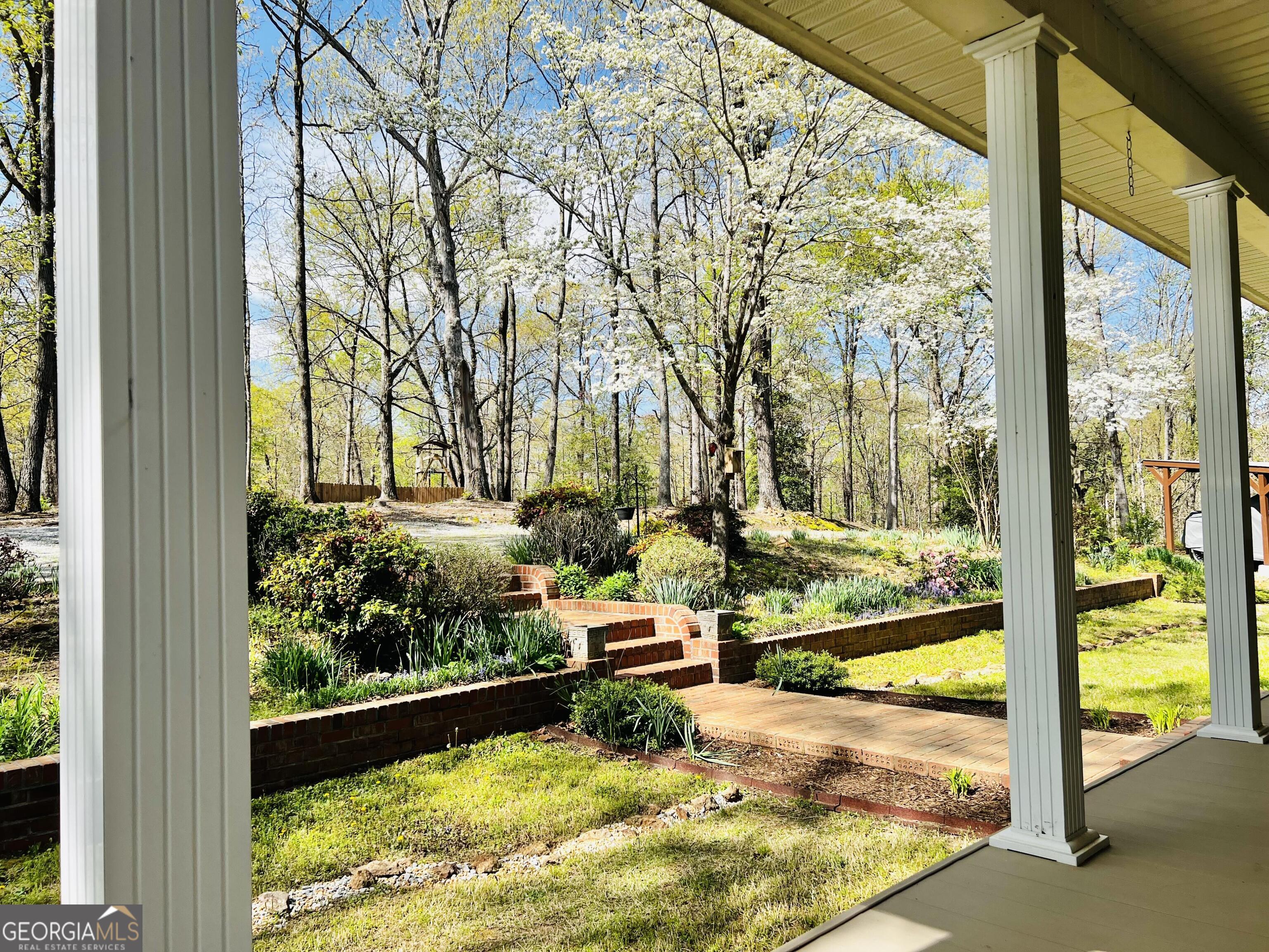 285 Wolf Den Road Royston, GA 30662 - Photo 4 of 60 a view of a lake from a window