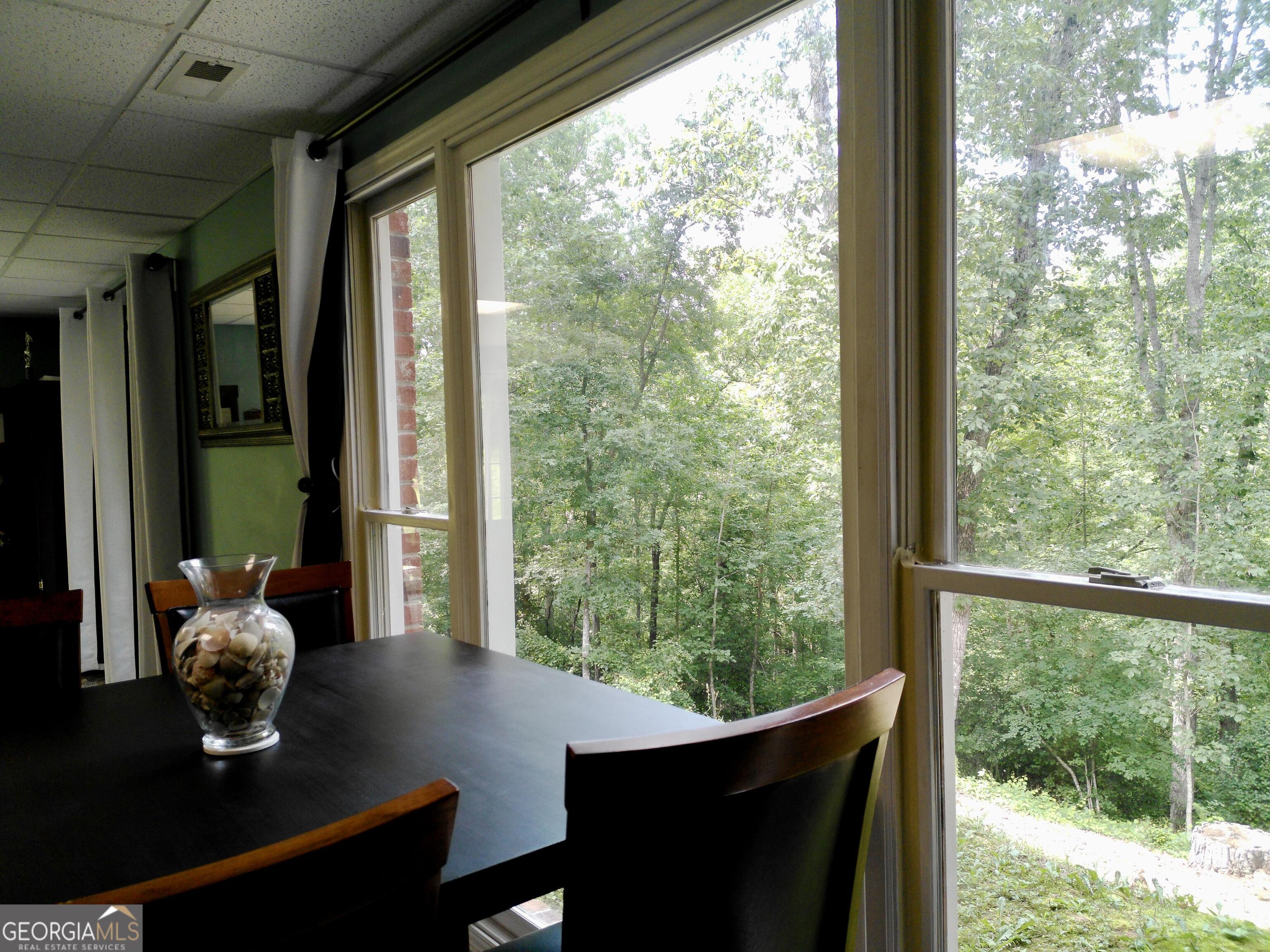 285 Wolf Den Road Royston, GA 30662 - Photo 44 of 60 a room with furniture and a window