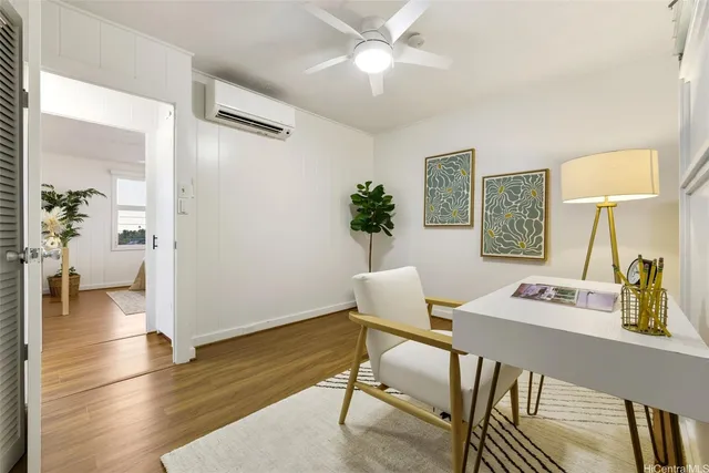 a workspace with furniture and window