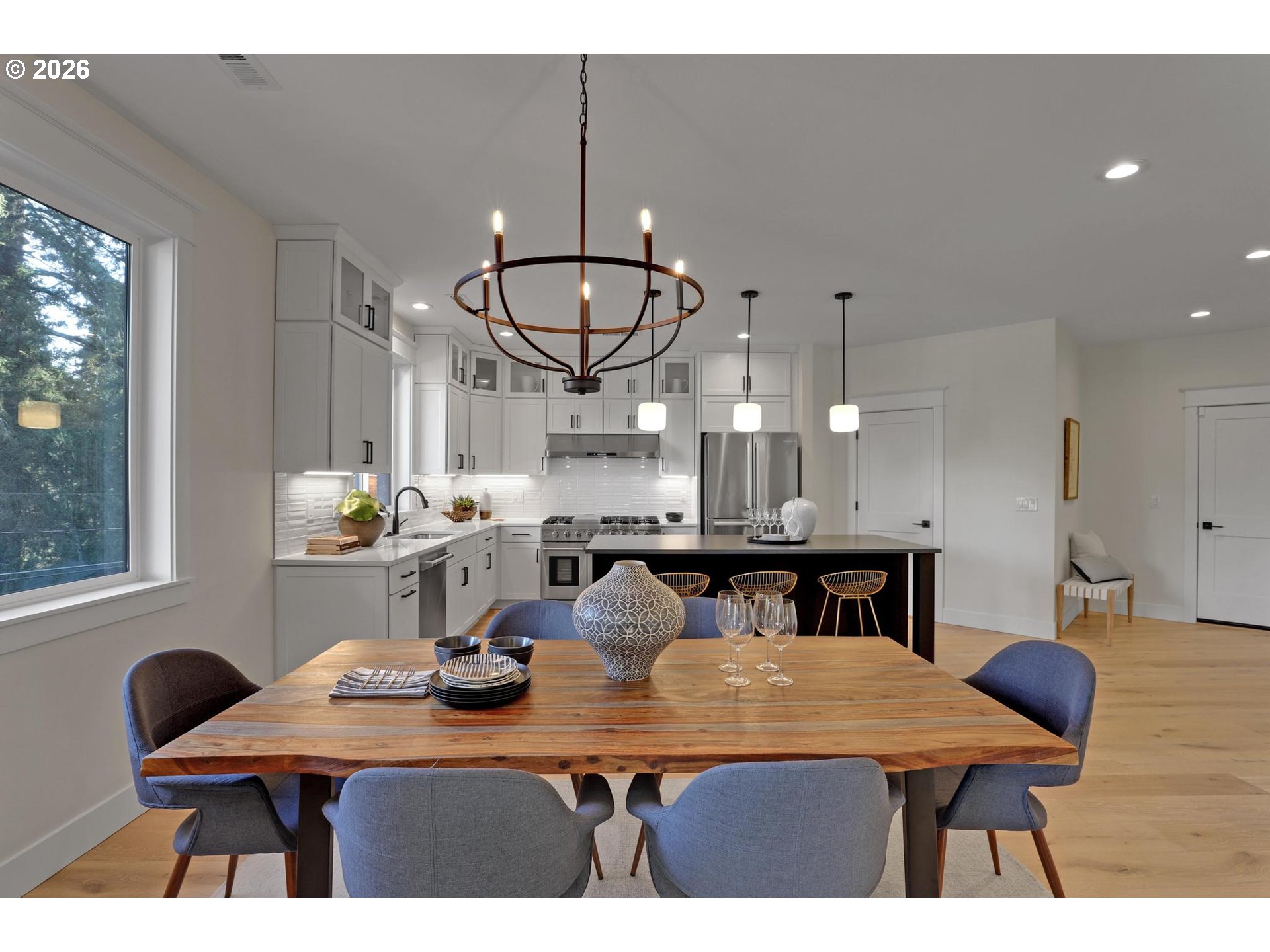 4022 Southeast Aldercrest Road Milwaukie, OR 97222 - Photo 12 of 40 a view of a dining room with furniture