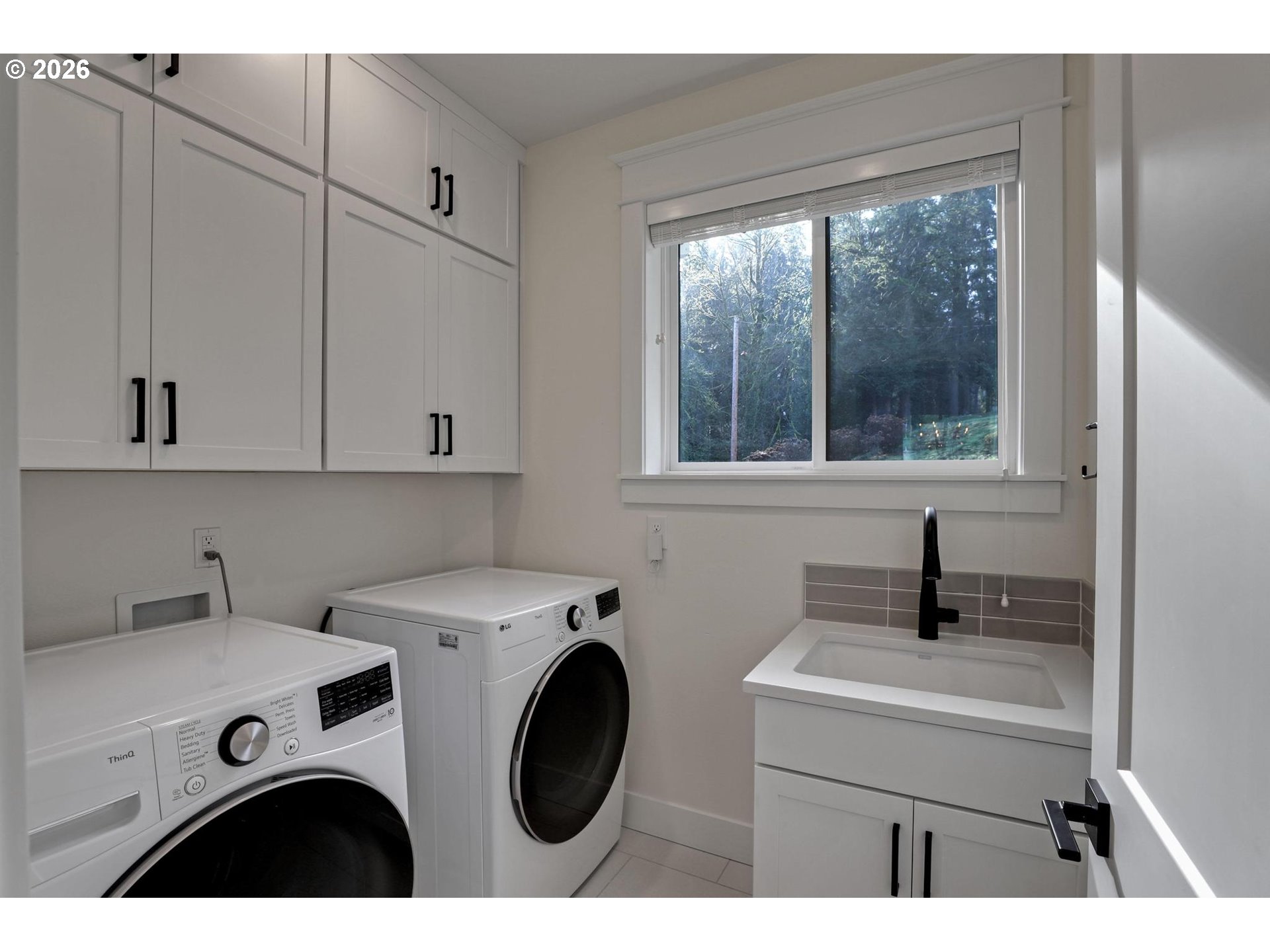 4022 Southeast Aldercrest Road Milwaukie, OR 97222 - Photo 19 of 40 a utility room with dryer and washer