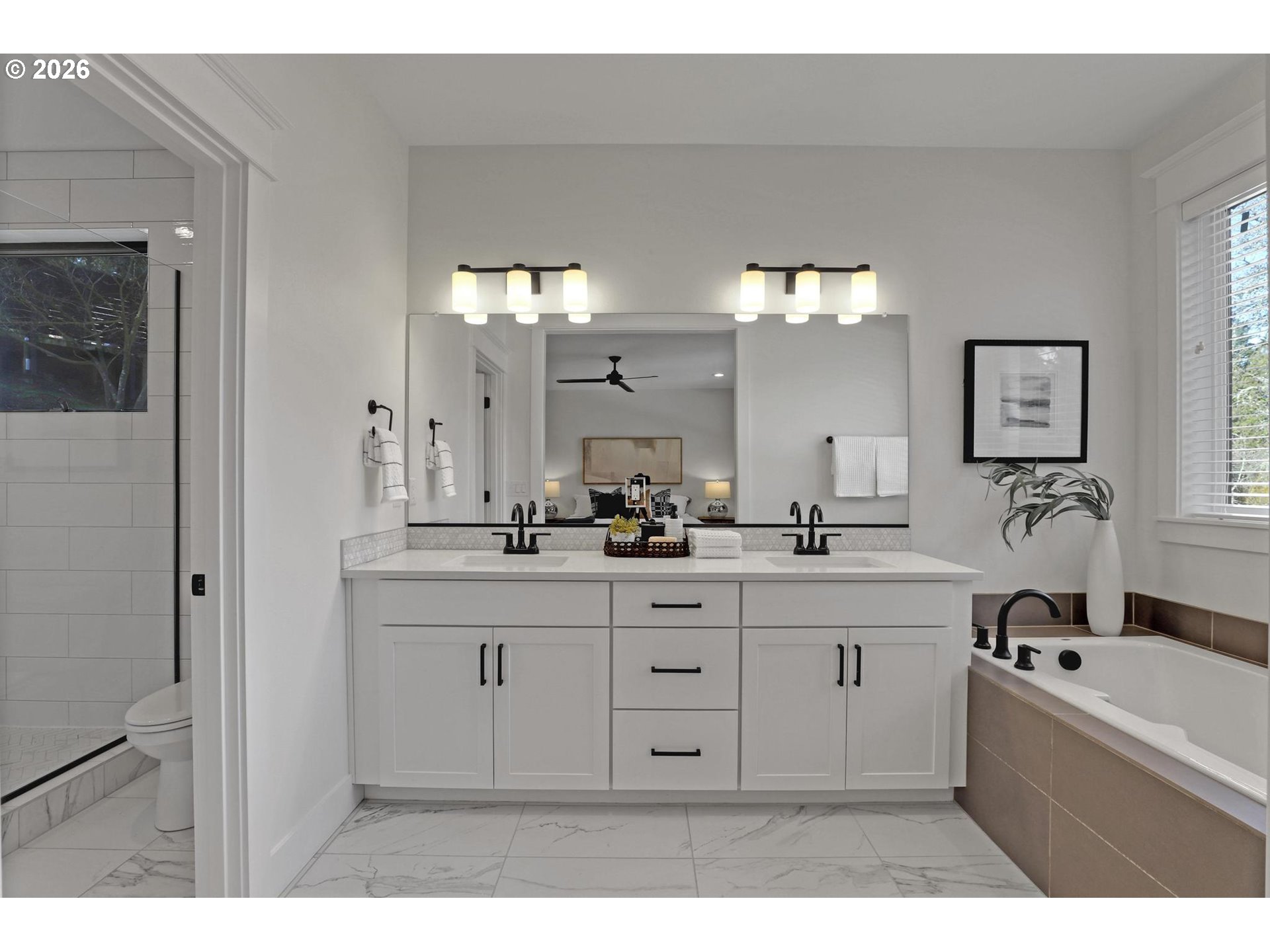4022 Southeast Aldercrest Road Milwaukie, OR 97222 - Photo 22 of 40 a bathroom with a sink a bathtub a mirror and vanity