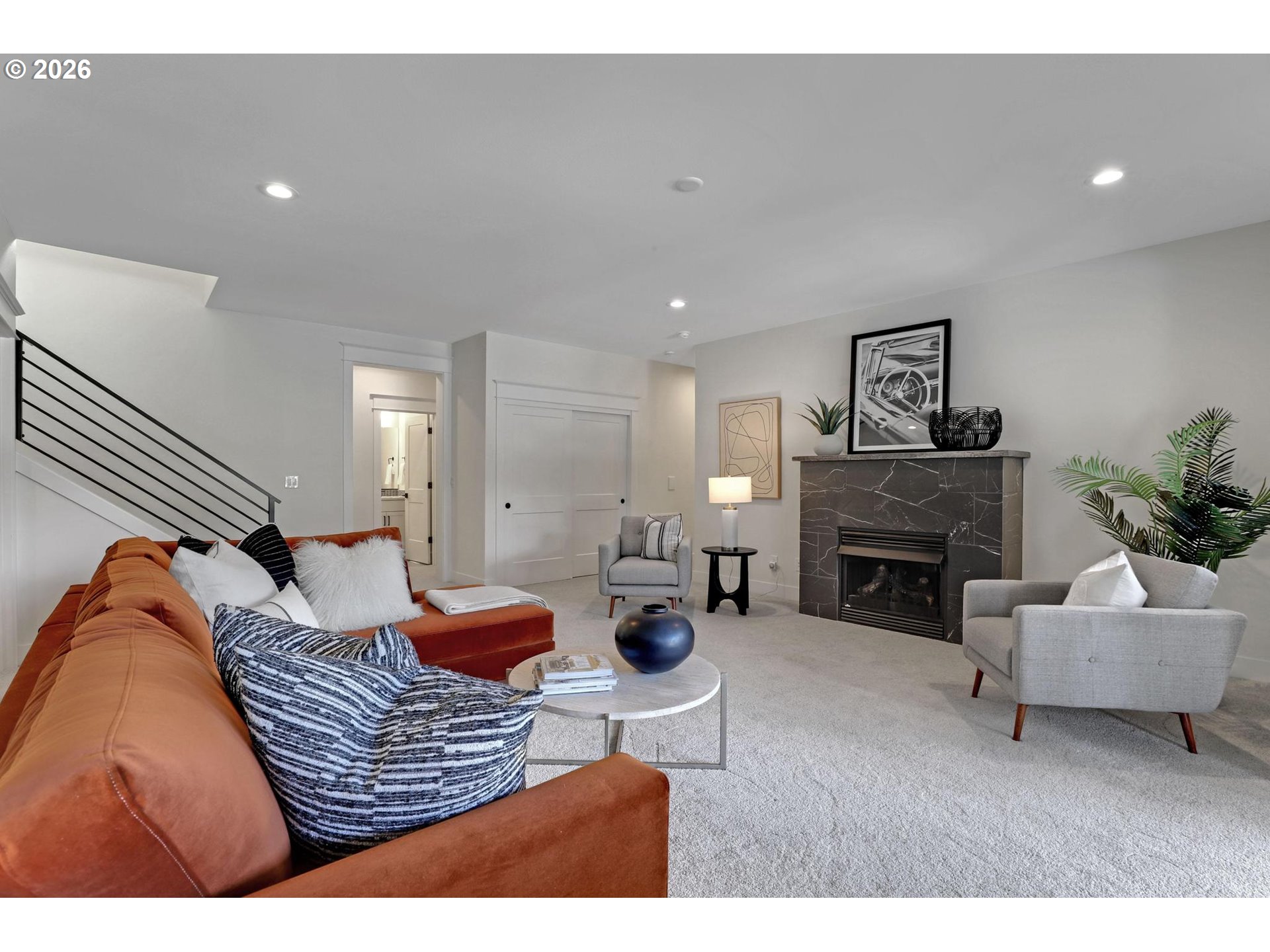 4022 Southeast Aldercrest Road Milwaukie, OR 97222 - Photo 25 of 40 a living room with furniture and a fireplace